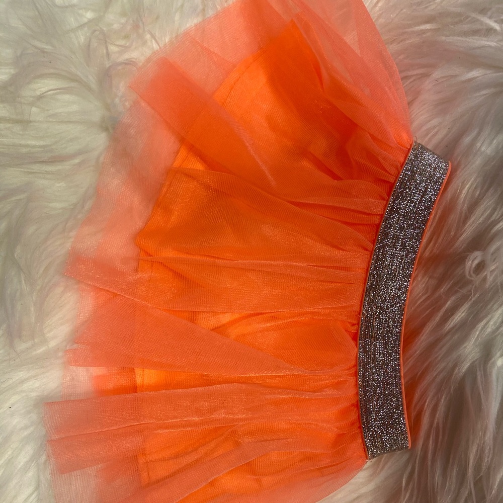 Four Newborn(0-3) tutus in variety of. Colors.